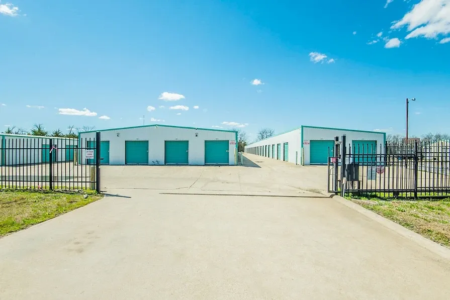 Gate entance at Overflow Garage Farmersville