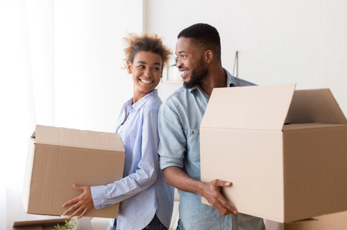 Couple packing boxes
